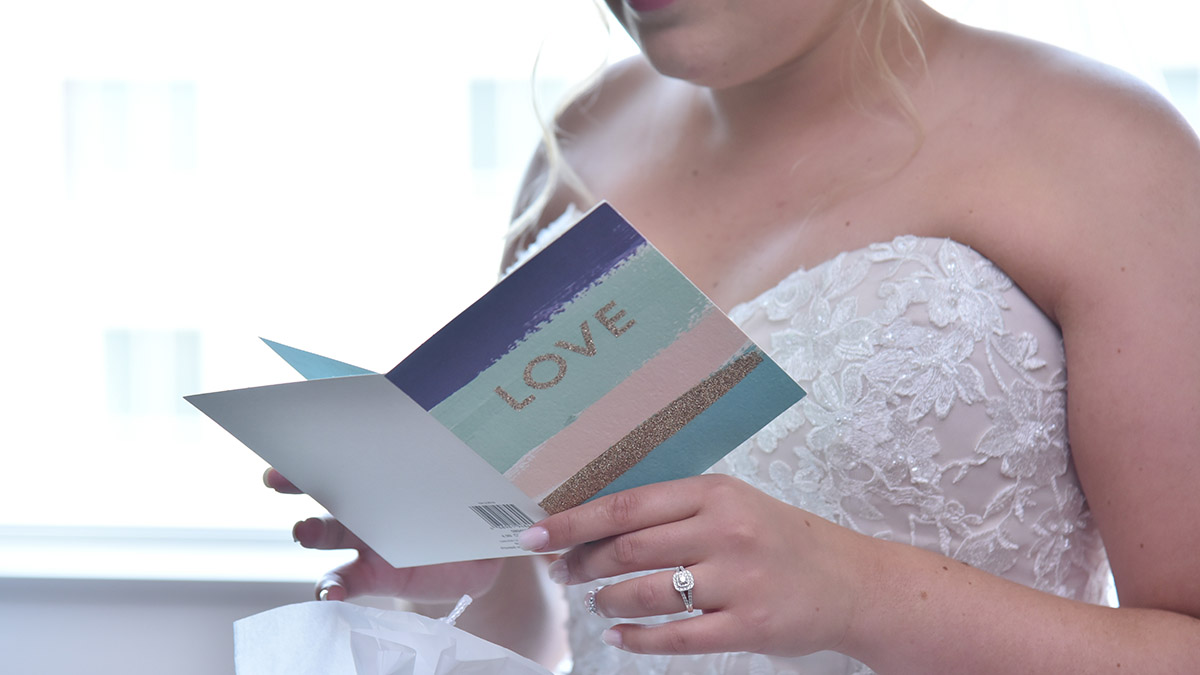 wedding wishes bride reading wedding card