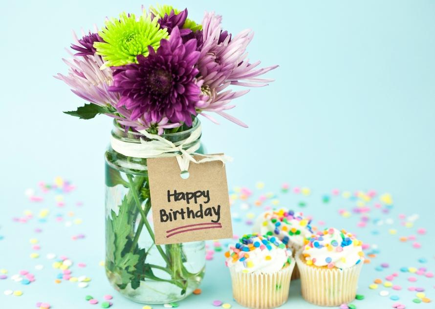 Happy birthday cupcakes and flowers