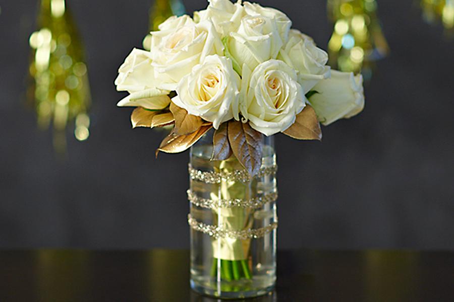 diy winter centerpieces with white roses in glitter vase