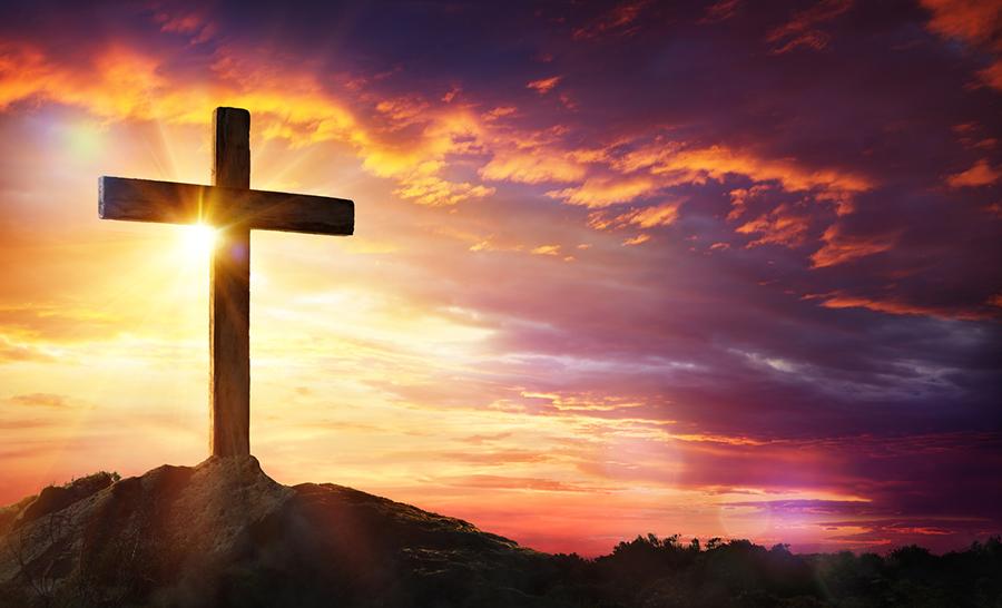 easter facts with a cross at sunrise