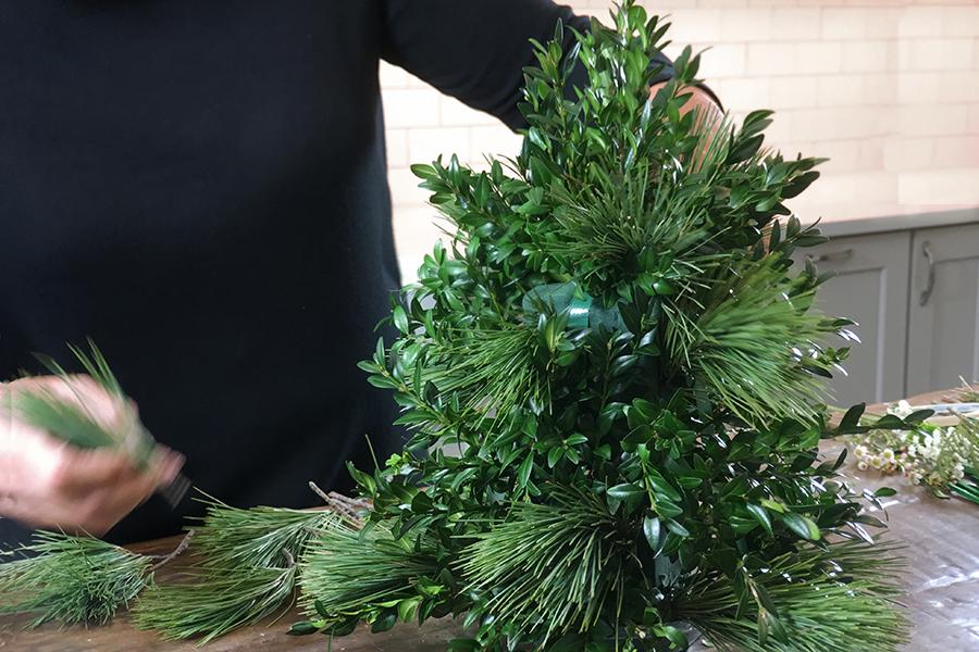 diy flower tree with adding evergreens to holiday flower tree