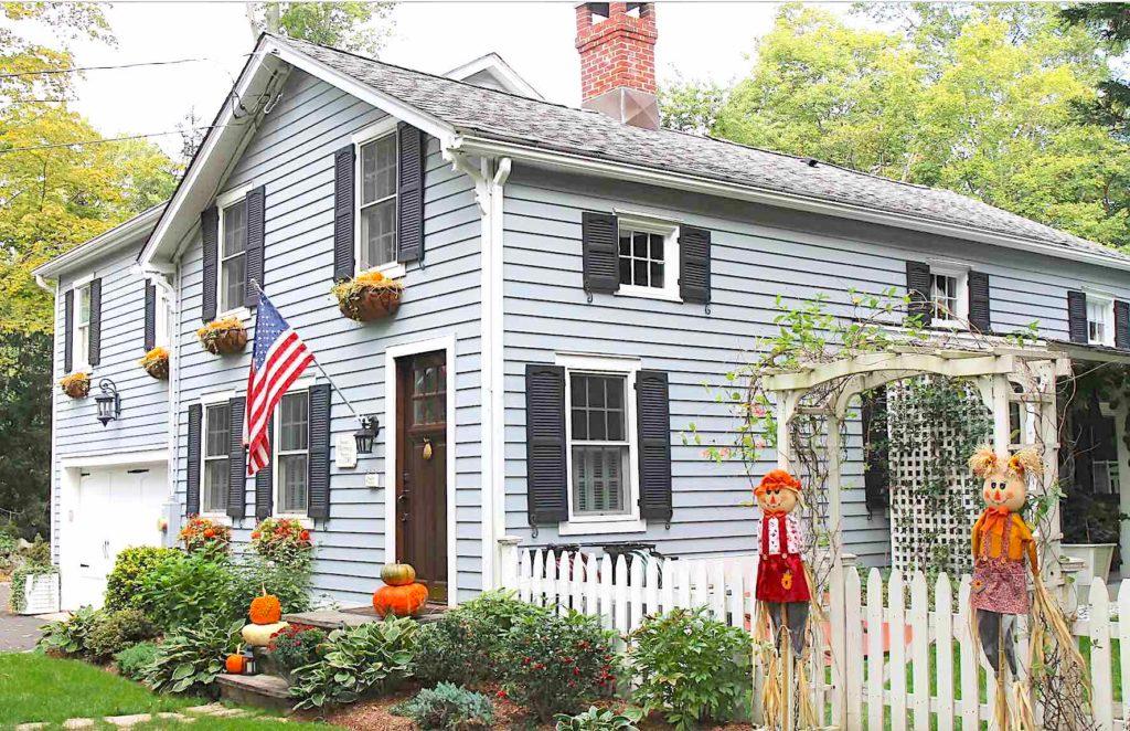 Picture of fall front porch ideas with flower boxes