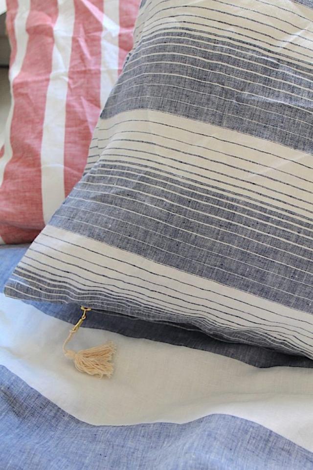 guest bedroom tips with striped Euro sized pillows