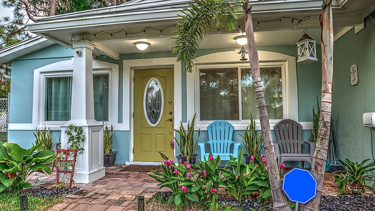 A photo of front porch ideas with a tropical looking front porch
