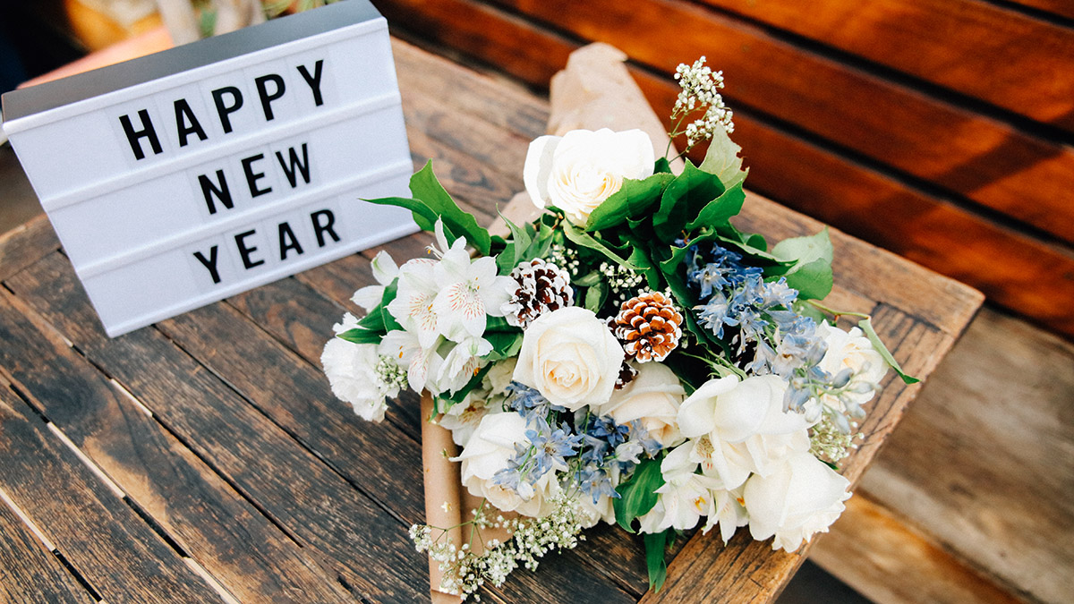 new years quotes flowers sign