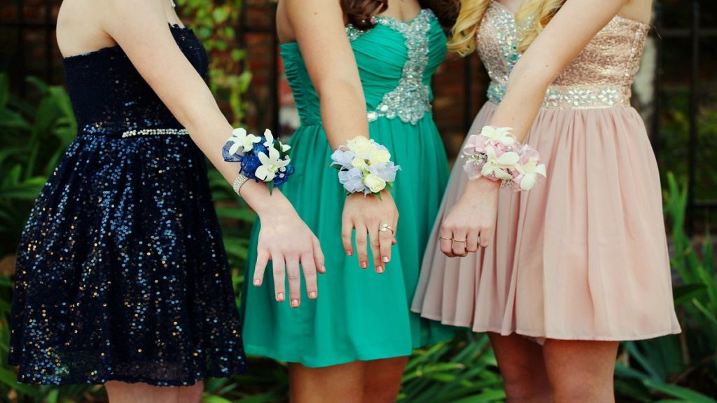 Three girls with corsages