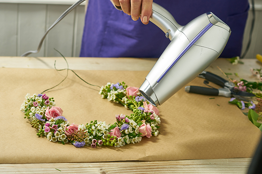 https://flowers.com/blog/wp content/uploads///use hairdryer to get rid of hot glue strings