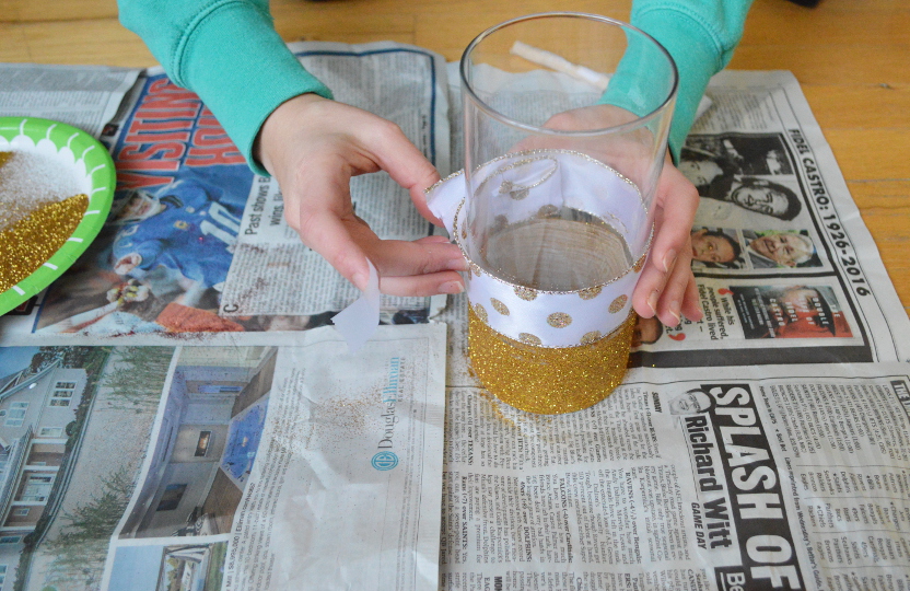 glue or tape ribbon onto vase