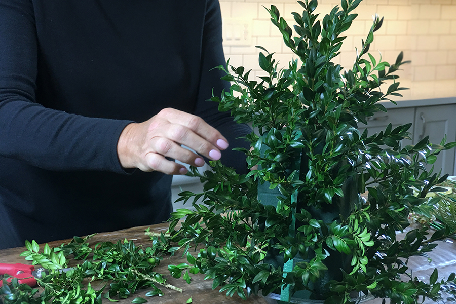 diy flower tree with adding greens to floral foam