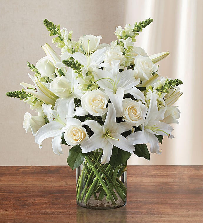 A bouquet of white roses and lilies