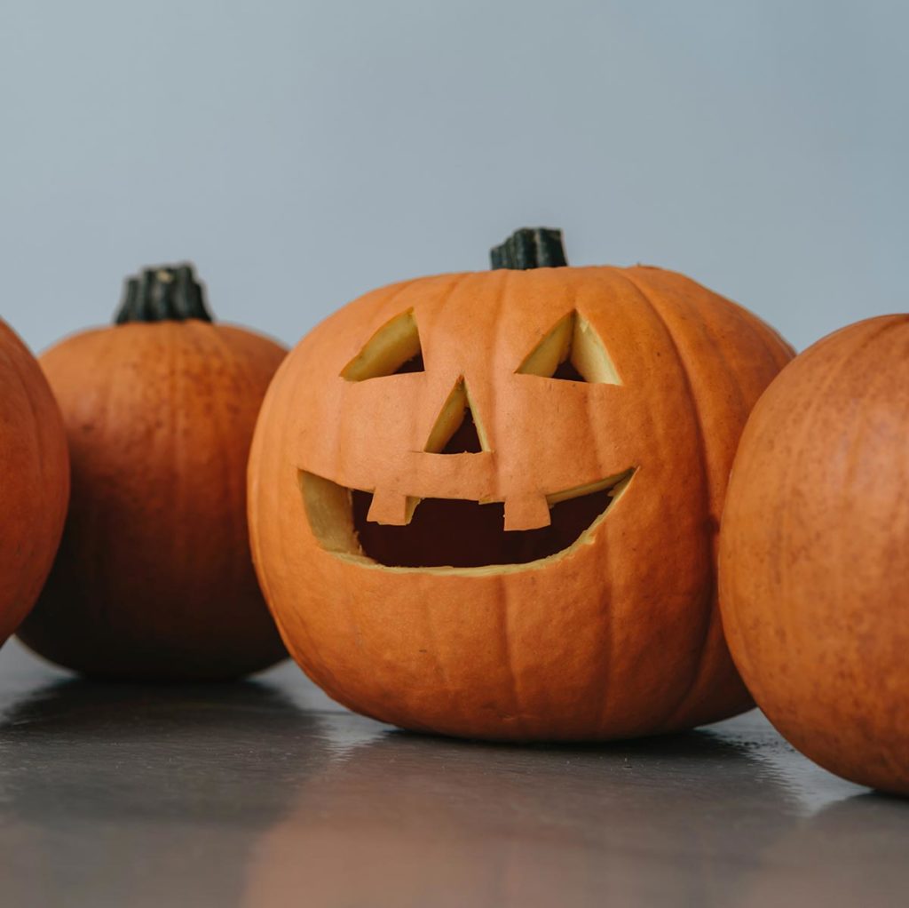 photo of fall activities with a Jack o' lantern