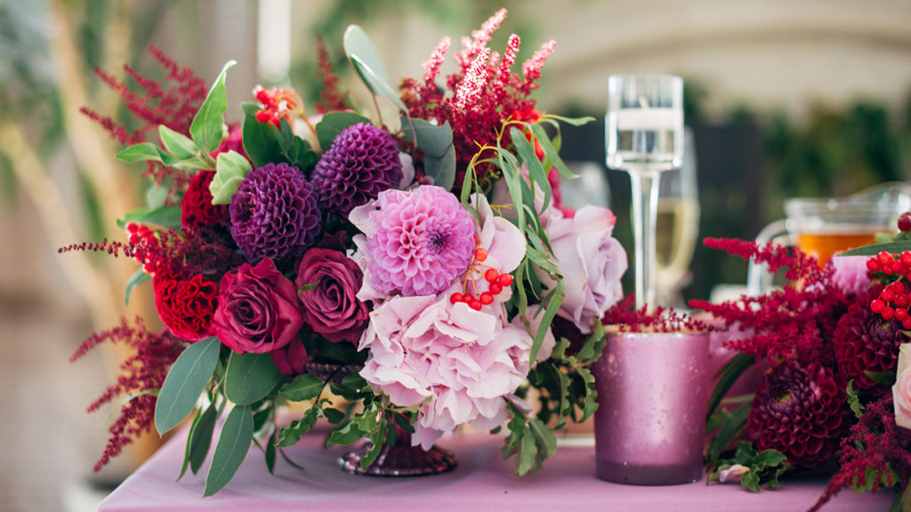 Wedding flower symbolism with Bouquet of asters, roses, and dahlias