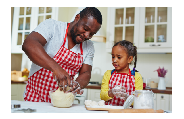 Dad and daughter baking