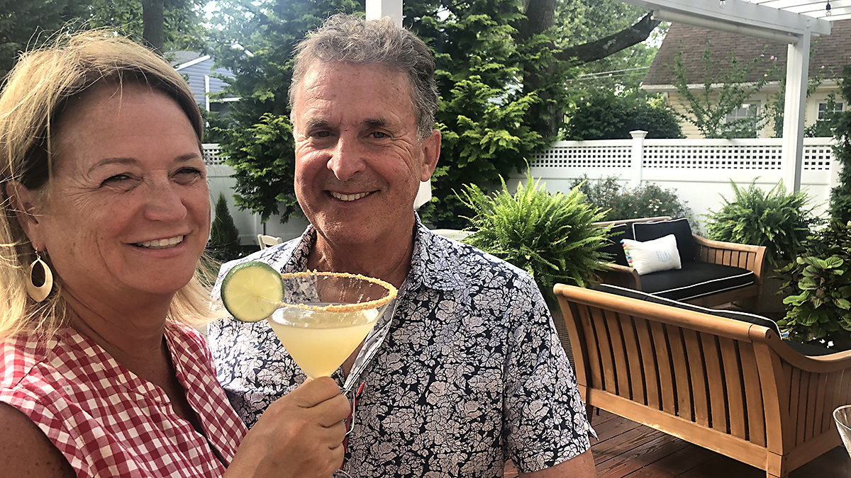 key lime martini with peggy holding a martini and bob