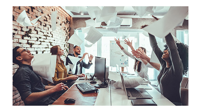 Photo of office workers celebrating