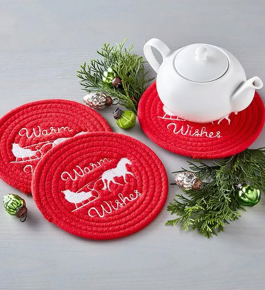 https://www.flowers.com/blog/wp content/uploads///white elephant gift ideas with Warm Wishes Holiday Trivets