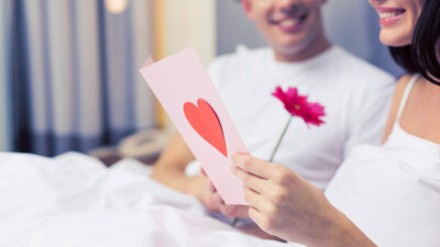 https://www.flowers.com/blog/wp content/uploads///love letter ideas with wife reading love letter in bed with husband x