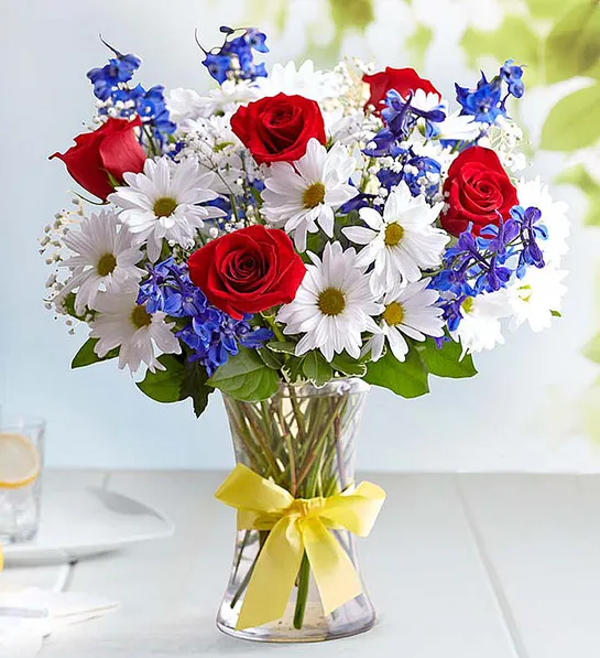 https://www.flowers.com/blog/wp content/uploads///patriotic flowers with Tie A Yellow Ribbon