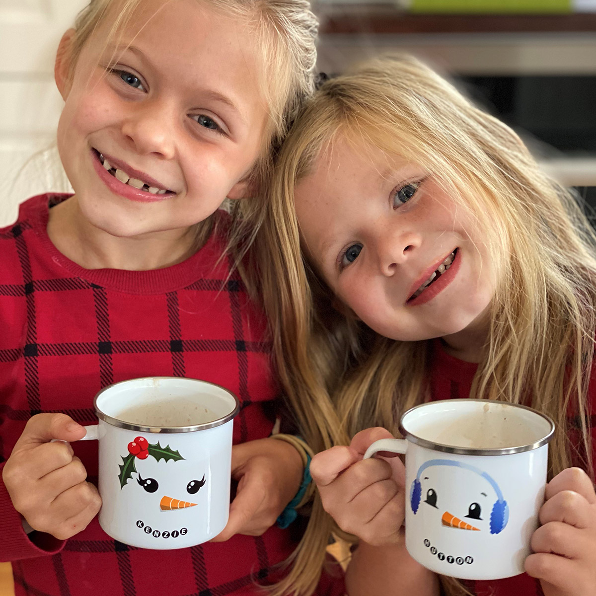 https://www.flowers.com/blog/wp content/uploads///winter quotes girls holding mugs of cocoa